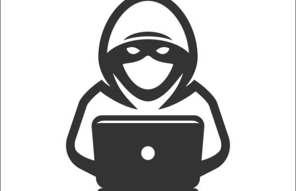 Computer hacker with laptop icon